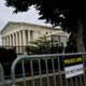 Fencing surrounds the U.S. Supreme Court as it nears the end of its term, June 27, 2022, in Washington, DC. The Supreme Court released three opinions, Concepcion v. the United States, Kennedy v. Bremerton School District, and Ruan v. the United States.